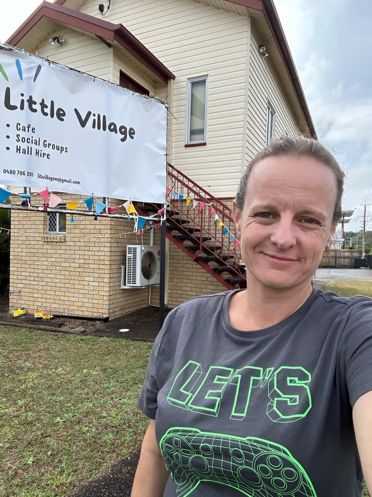 Danielle standing out the front of the Little Village building